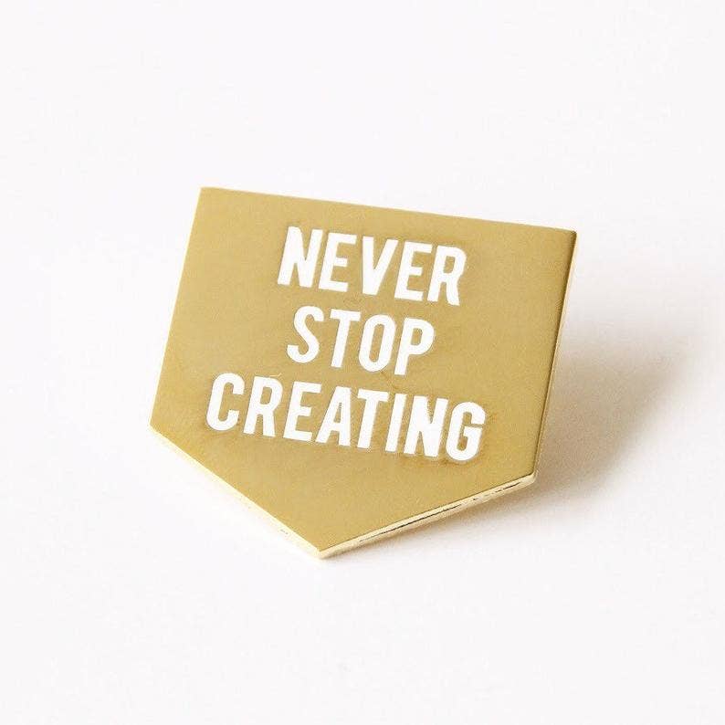Gold Never Stop Creating Enamel Pin