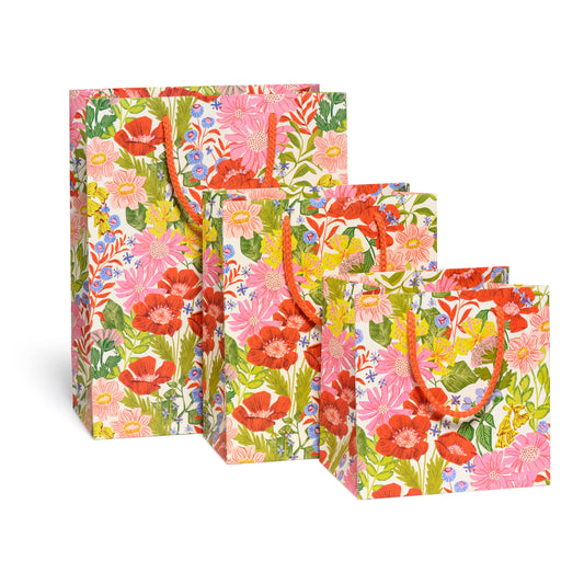 Our Love Only Grows gift bags